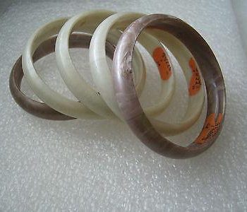 Vintage plastic swirl bangles bracelets with Israeli label - lot of 5
