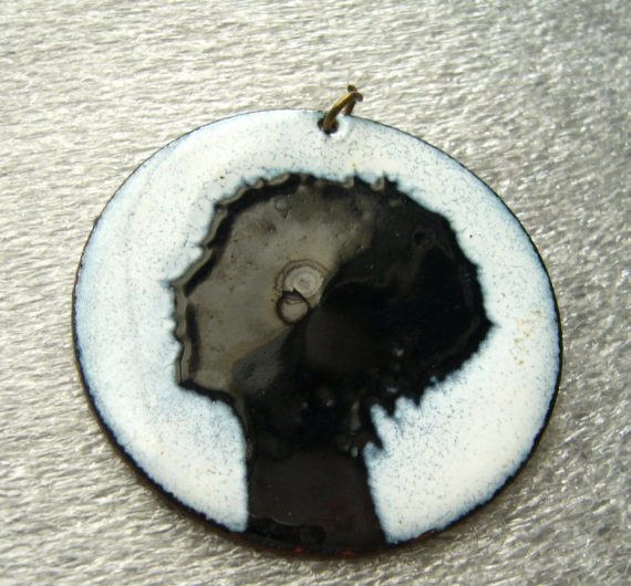 Vintage 1960’s enamel woman head profile pendant