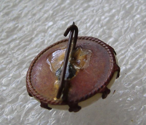 Vintage old swirl glass on copper pin brooch
