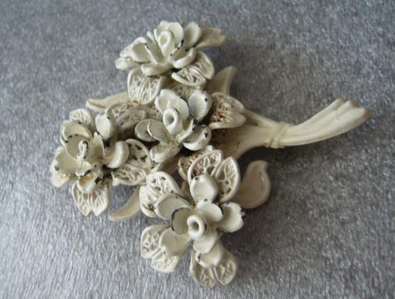 Vintage carved celluloid filigree flower pin brooch