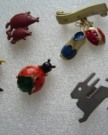 Vintage painted tin small pin brooches collection