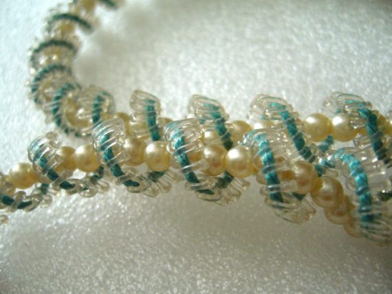 Vintage  early plastic delicate braided light blue necklace