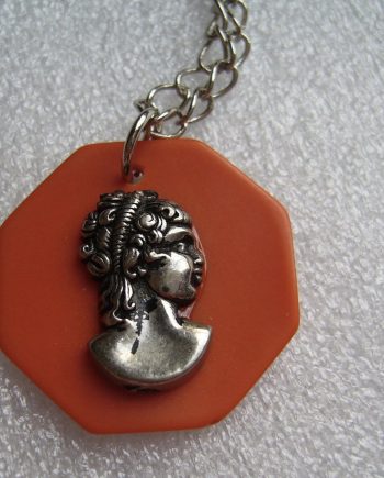 Vintage early plastic galalith cameo pendant necklace - bakelite style.