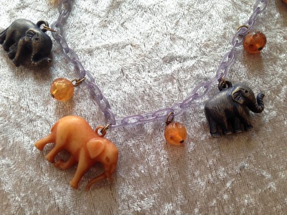 Vintage early plastic elephants necklace