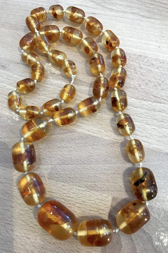Vintage faux amber early plastic knotted necklace