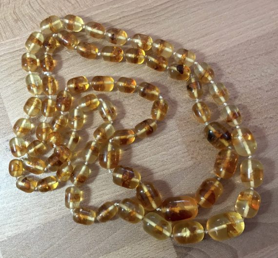Vintage faux amber early plastic knotted necklace