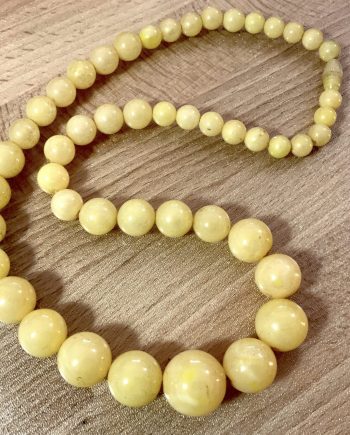 Vintage light yellow beaded early plastic necklace